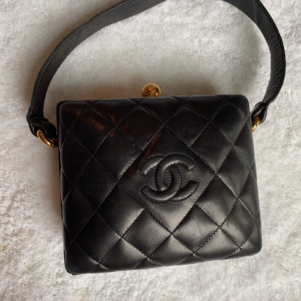 Vintage Chanel Top handle black quilted leather.
